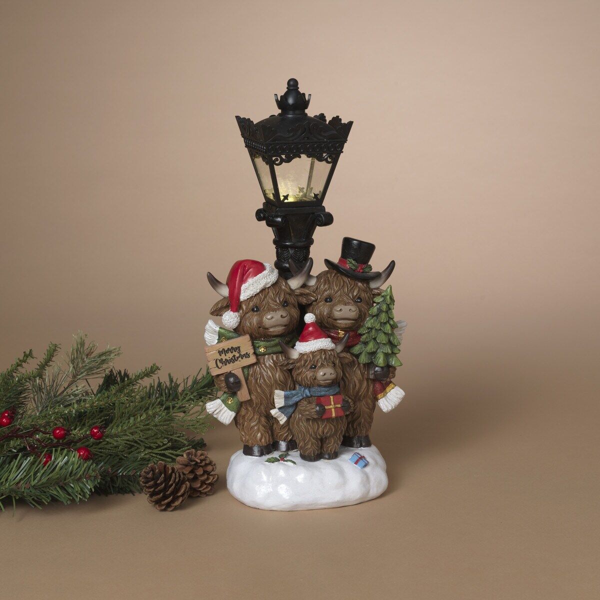 Gerson Lighted Resin Holiday Highland Cow Family With Street Lamp & Timer