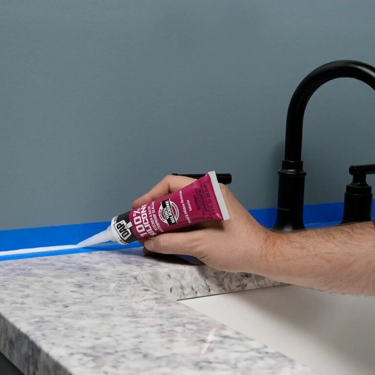 DAP 100% Silicone Rubber Clear Kitchen, Bath, & Plumbing Sealant, 9.8-Oz