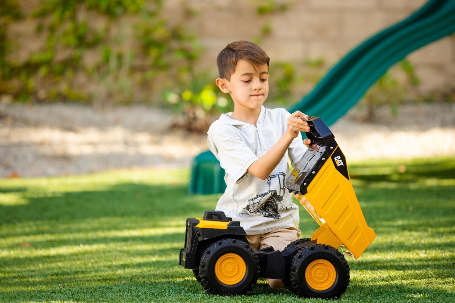 Funrise Cat Mighty Steel Dump Truck Toy